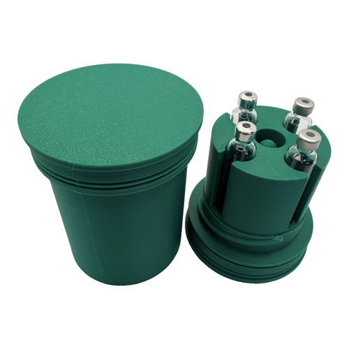 3CPrints injectable pen vial case open, showing four vial bores and the centre primer well, green